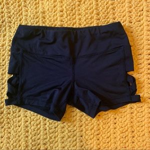 Black booty shorts with caged detail